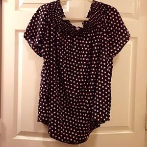Black smocked top with pink stars